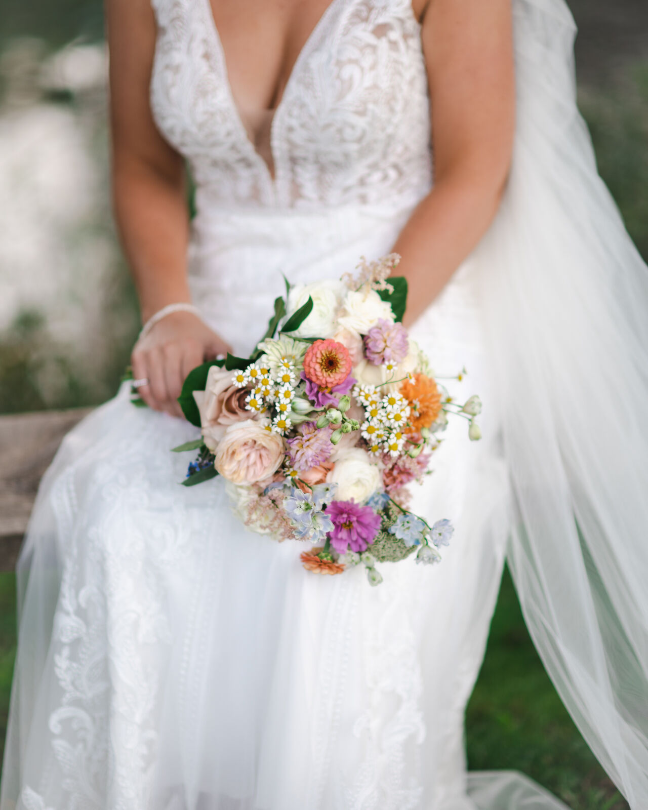 Elopement bouquet held by a bride in New Hampshire